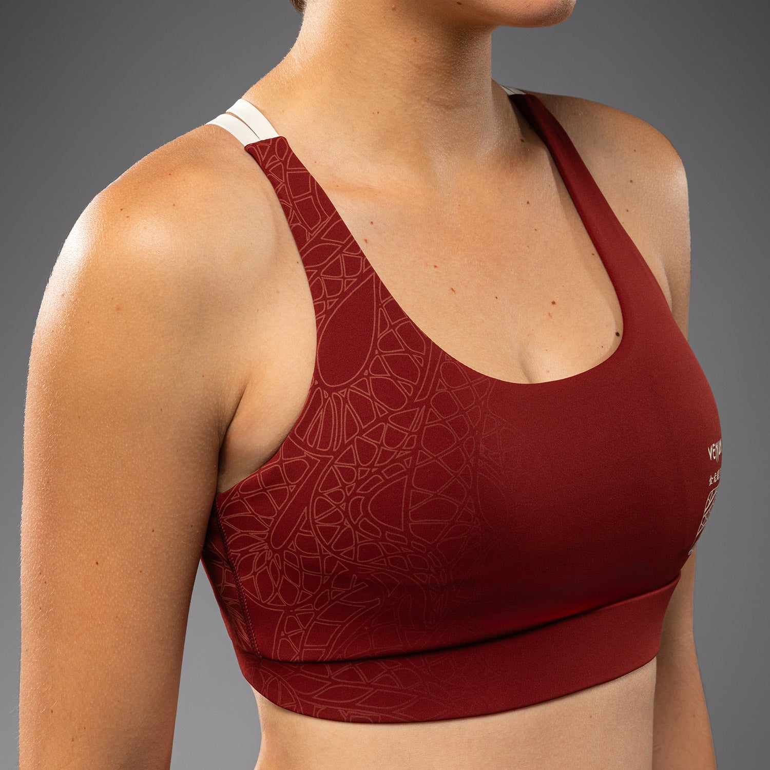 Жіночий спортивний бюстгальтер Venum Serpenti Sport Bra Burgundy Ivory ціна