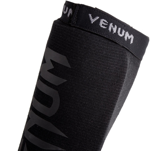 Venum Kontact Shinguards - Matte Black ankle protection photo