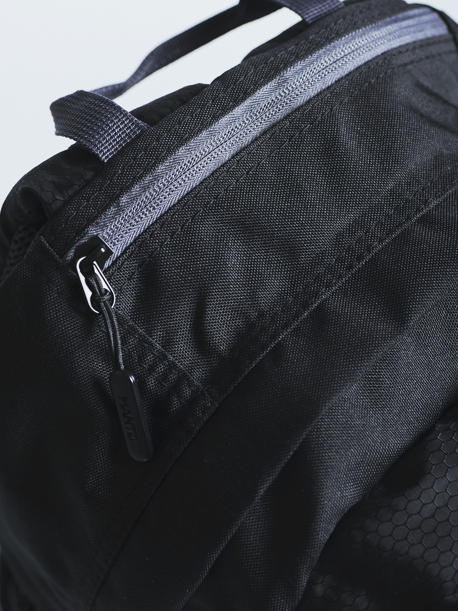 MANTO Backpack Cross Black Reflective where to buy