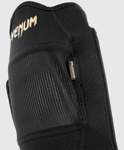 Venum Kontact Evo Shinguards Black Gold leg protection photo