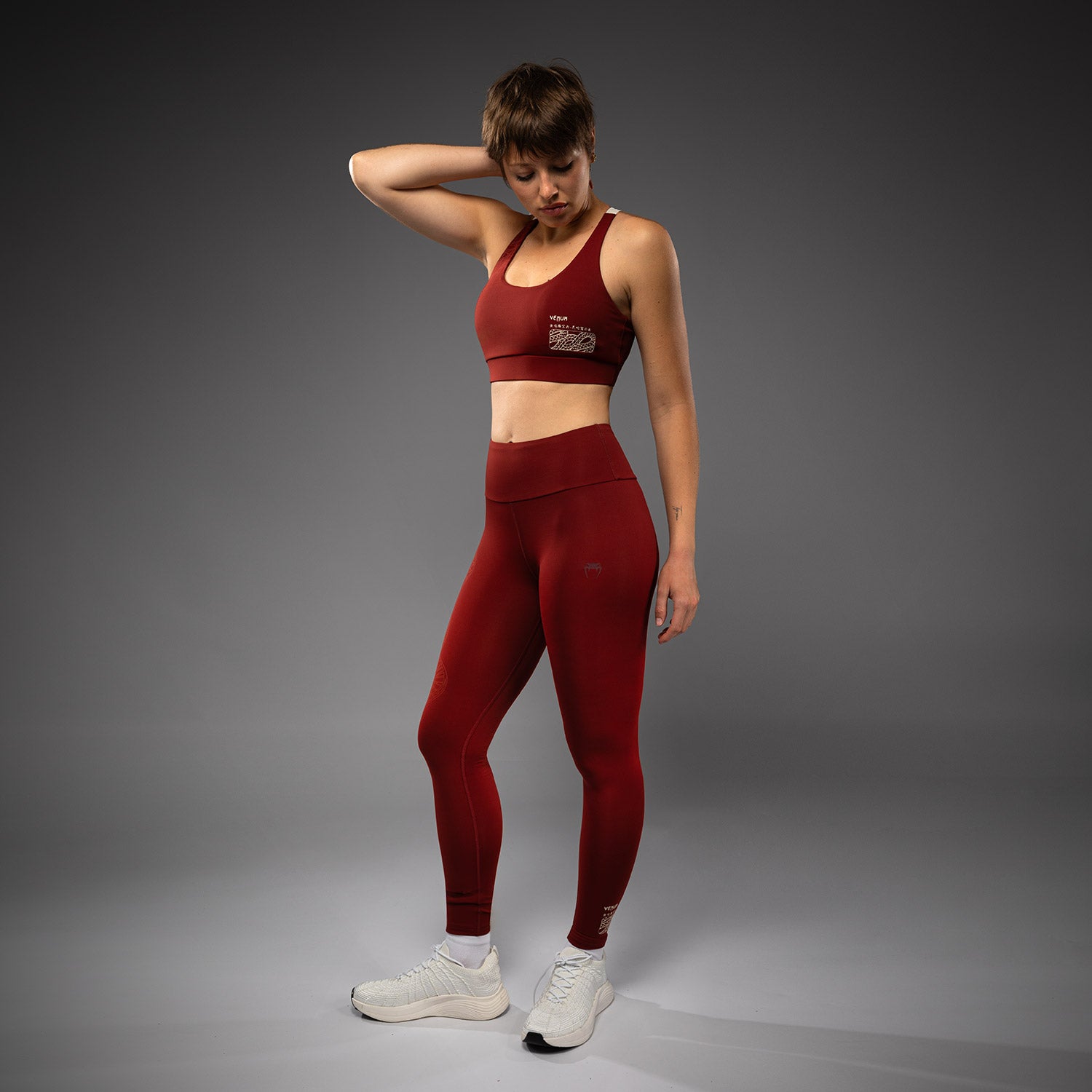 Жіночі легінси Venum Serpenti Leggings Burgundy Ivory ціна