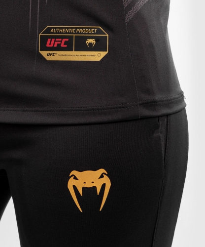 Женская футболка Venum Authentic UFC FightNight Dry Tech Black Gold фото